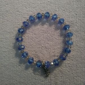 LIGHT BLUE AND CLEAR BEADED MEMORY WIRE BRACELET